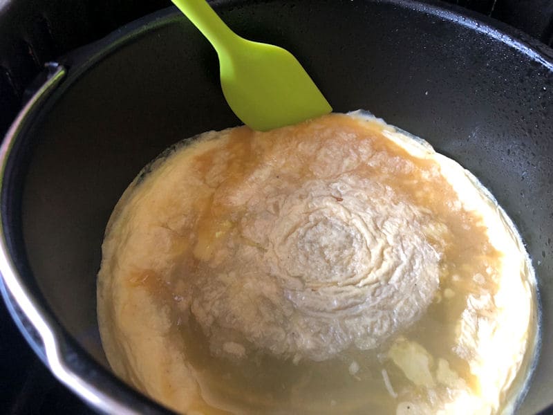 Air fried omelette cooked in air fryer inside cake pan