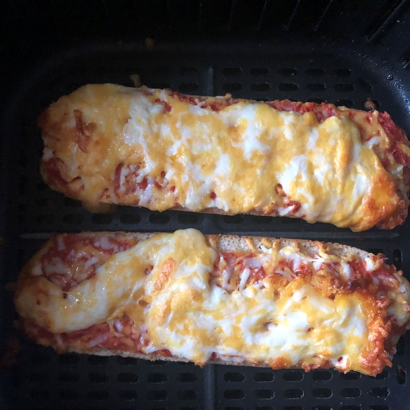 Frozen pizza subs sat in air fryer basket