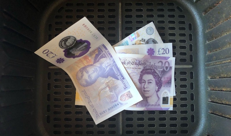 Great British Pound notes in bottom of my air fryer basket