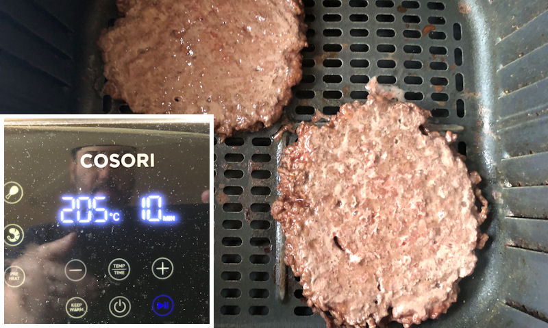 Preheated air fryer display; large image showing half cooked beef patties