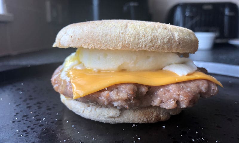 Breakfast muffin with sausage patty, cheese and air fried egg