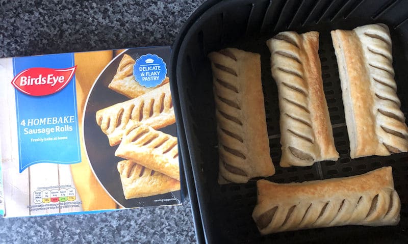 Birds Eye homebake sausage roll box next to air fryer basket