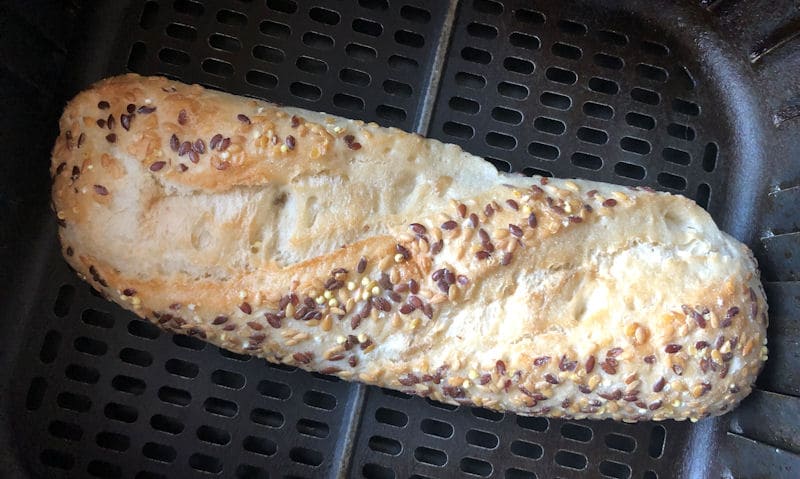 Heat & Eat Crusty Seeded Baguette in air fryer basket