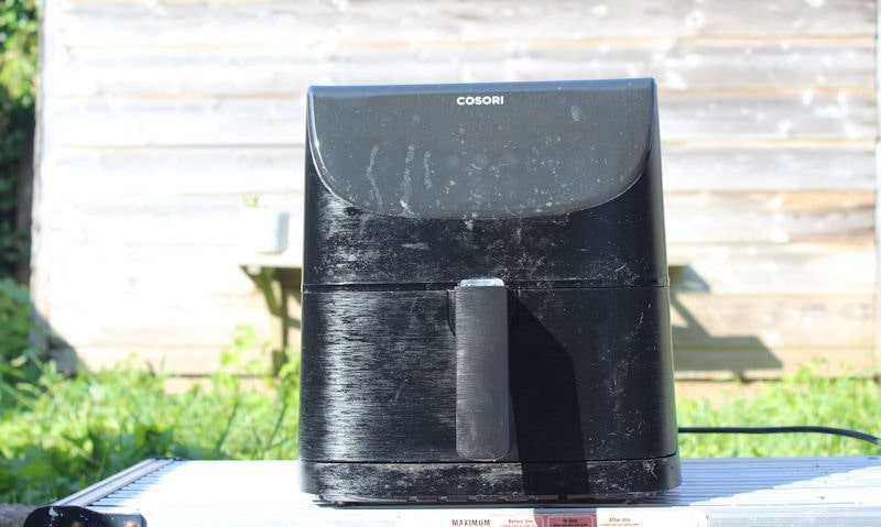 My Cosori air fryer setup in my back garden in front of my shed