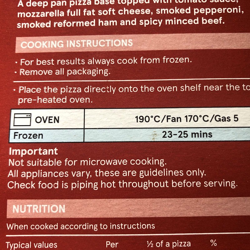 Close up shot of oven cooking instructions on Tesco frozen pizza box