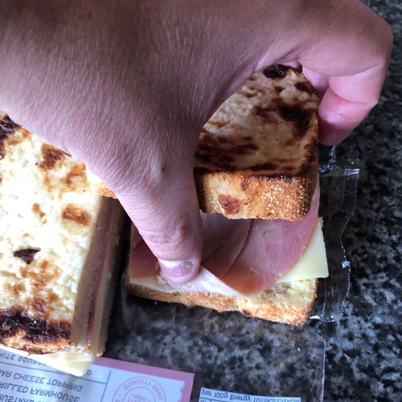 Me tucking ham back into toastie to prevent burning