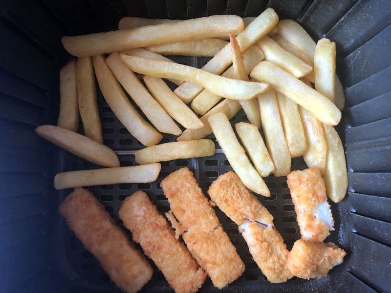 Fish fingers and chips in air fryer basket