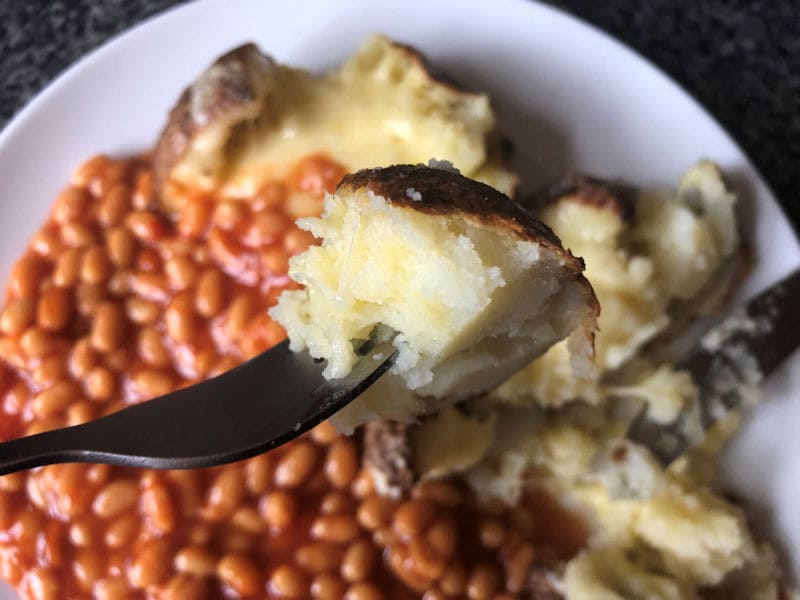 McCain jacket potatoes with melted Cheddar and baked beans