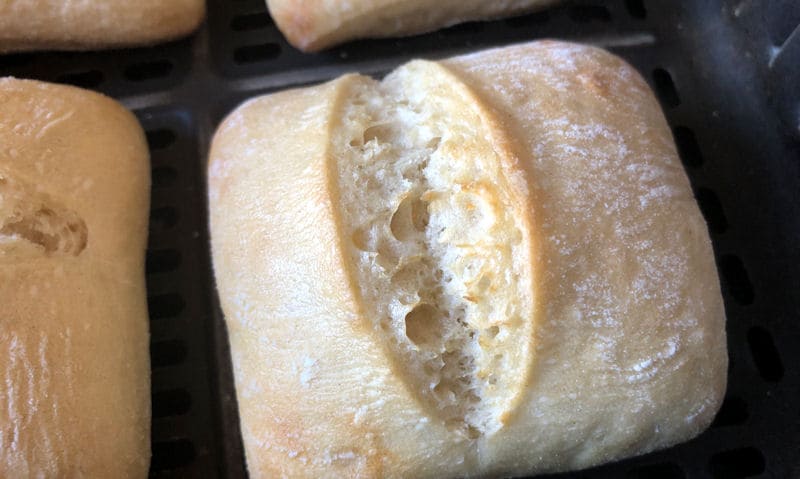 Rustic part baked rolls in air fryer basket