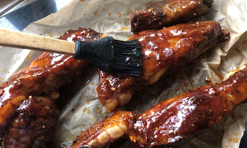 Homemade Honey BBQ sauce brushed onto air fried pork rib slices