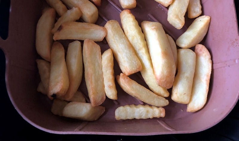 Chunky French fries air fried in silicone basket