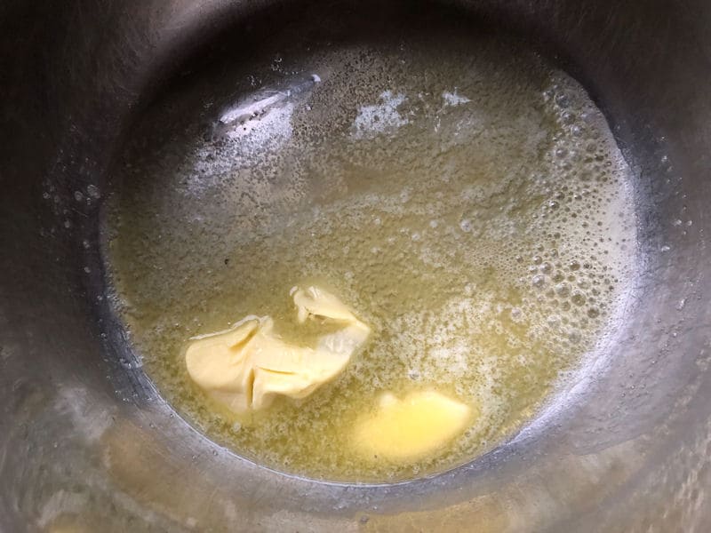 Melting butter in stainless steel saucepan