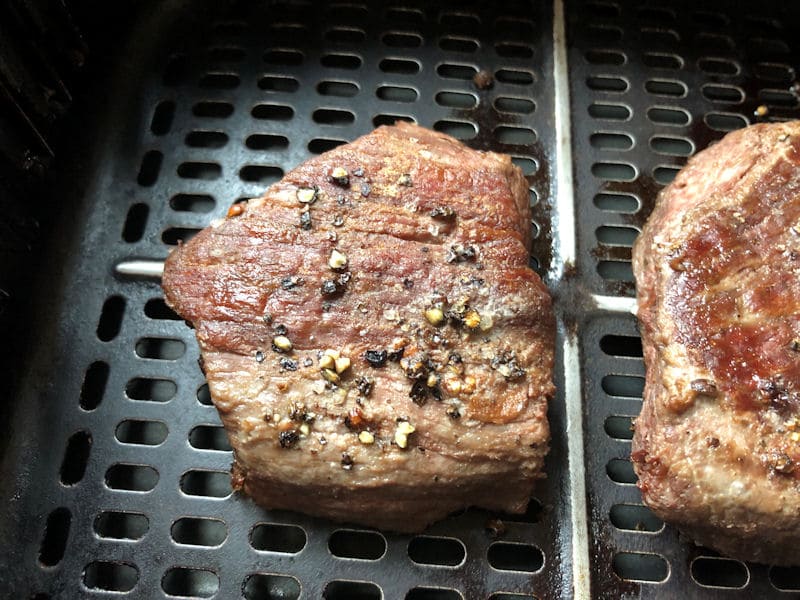 Air fried Ostrich fillets positioned in basket