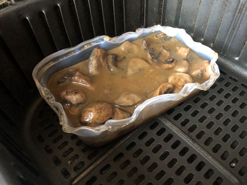 Chinese mushroom takeaway plastic container partially melted in air fryer