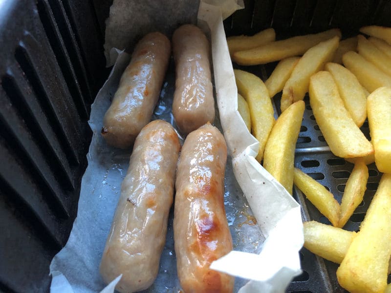 Sausage and chips air fried together in basket