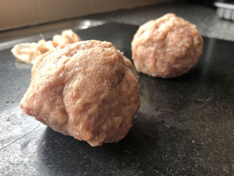 Two near perfect raw pork sausage balls